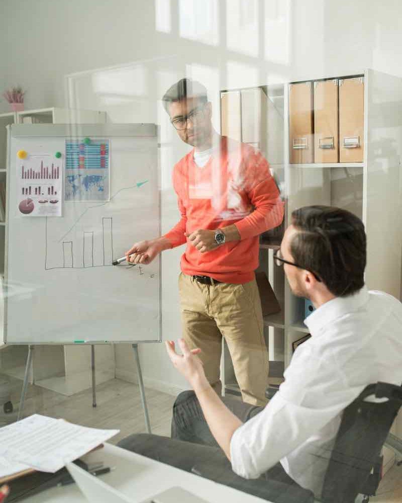 business-people-developing-a-business-plan-935VASB.jpg
